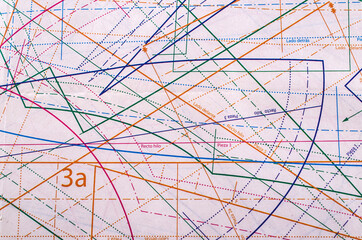 Beige background with blueprints