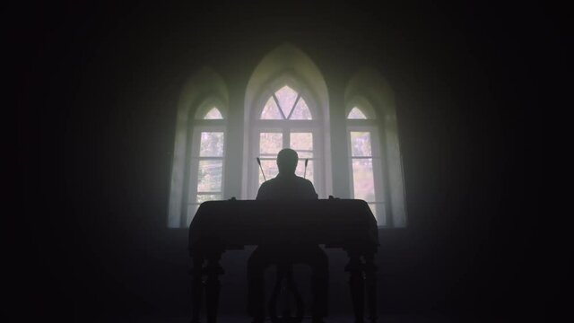Dulcimer music player silhouette. Male musician playing cimbalom music. Dulcimer player man silhouette. Cimbalom music instrument. Folk musician playing. Traditional music instruments