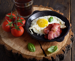 Fried eggs and fried bacon