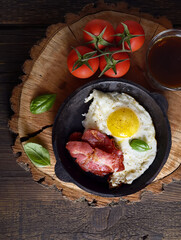 Fried eggs and fried bacon