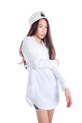 Young asian boy with long hair over white background