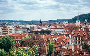 Red tiled roofs of the majestic old Prague. Ancient European architecture