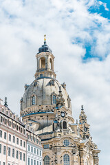 Fototapeta na wymiar Majestic dome of the Frauenkirche Lutheran Cathedral in Dresden, Germany. The ancient architecture of Germany