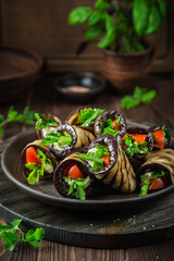 grilled eggplant rolls with garlic feta, tomato and herbs