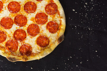pizza on the wooden background