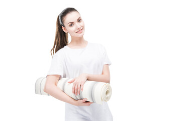 portrait of smiling woman with yoga mat looking at camera isolated on white