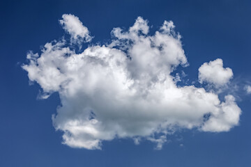 Naklejka na ściany i meble background of a blue sky with a lonely white cloud