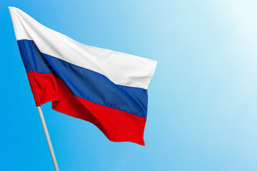 Fototapeta na wymiar Russian flag against blue sky