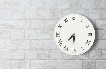 Closeup white clock for decorate show half past seven o'clock or 7:30 a.m. on old brick wall textured background with copy space in interior concept