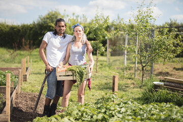 Portrait of a young couple on a farm