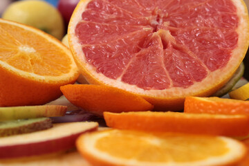 sliced grapefruit ,lemons,kiwi,tangerines and oranges