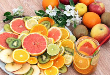 sliced grapefruit ,lemons,kiwi,tangerines and oranges