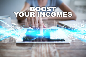 Woman using tablet pc, pressing on virtual screen and selecting boost your incomes.