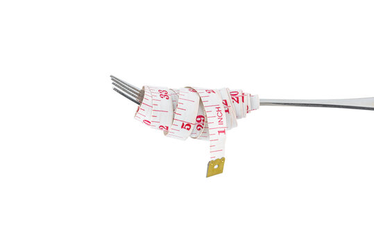 Diet concept, Steel fork and measuring tape isolated