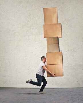 Carrying a pile of boxes