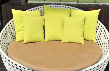 outdoor furniture rattan chairs with pillow on terrace