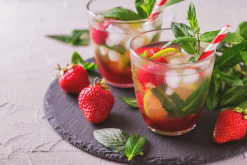 Cold lemonade with fresh strawberry, mint, lime and jam