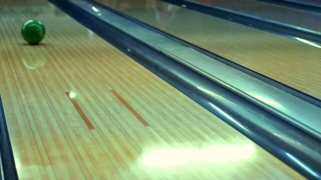 Bowling ball on bowling alley slow motion