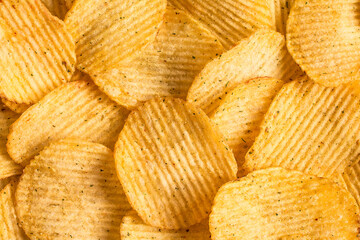 Potato chips texture background. Potatoes pattern.
