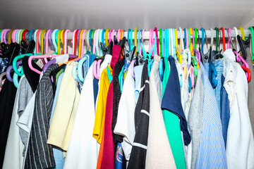 messy clothes in closet