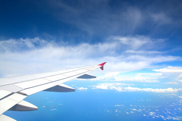 Fototapeta na wymiar Aircraft flying over Singapore island.