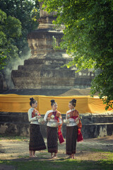 Asian women wearing typical (traditional)Thai dress,vintage original Thailand attire ,identity culture of Thailand,Songkran festival.