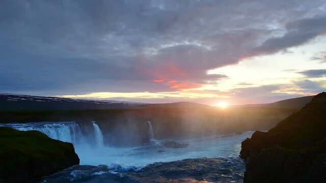 Fantastic sunset. Hodafoss very beautiful Icelandic waterfall 12 meters high. It is located in the north near Lake Myvatn.