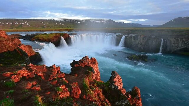 Fantastic sunset. Hodafoss very beautiful Icelandic waterfall 12 meters high. It is located in the north near Lake Myvatn.