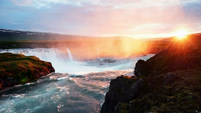 Fantastic sunset. Hodafoss very beautiful Icelandic waterfall 12 meters high. It is located in the north near Lake Myvatn.