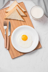 Traditional breakfast with fried eggs on a plate