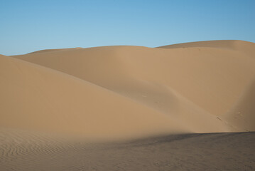 sand dunes in the desert "Dasht-e Kavir" at sunset in Iran