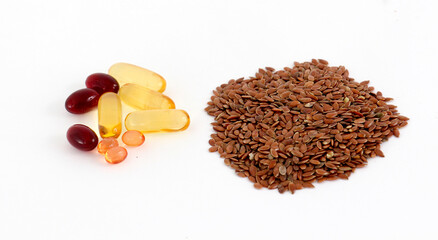 flax seeds and omega 3 capsules on white background