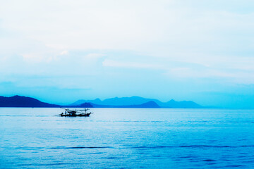 Fototapeta na wymiar silhouette long tail boat at sunset,Koh Tao,Thailand