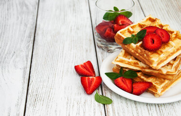 belgian waffles with strawberries and mint