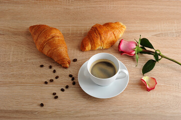 morning Breakfast - two croissants, coffee and red rose