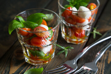 Small caprese salad in a glass