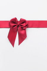 Red ribbon on white background, holiday and event concept and decoration idea