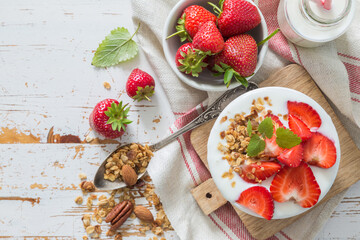 Breakfast - yogurt with granola and straberries