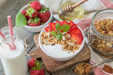 Breakfast - yogurt with granola and straberries