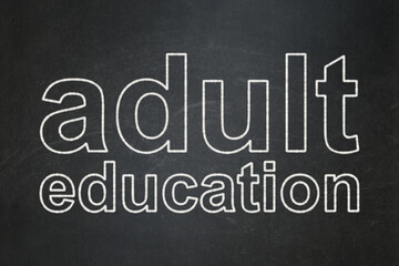 Studying concept: Adult Education on chalkboard background