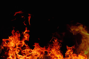 Fototapeta premium Texture of fire on a black background.