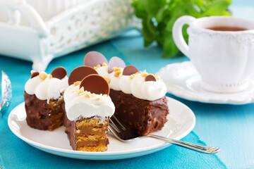 Chocolate cake with caramel, peanut cream 