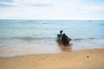 Motor boat on the sand beach 