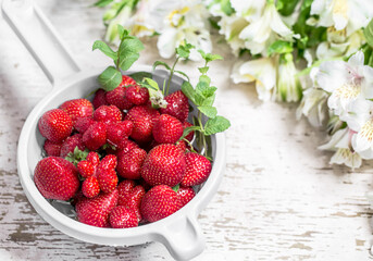 Fresh strawberries in a bowl for washing