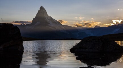 The Matterhorn reflected in lake stellisee the last light of sunset, Zermatt valley, Valais-Wallis Canton, Switzerland