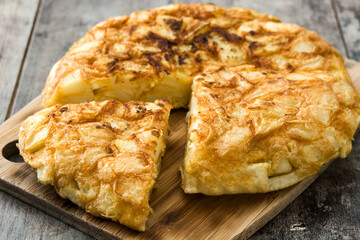 Traditional spanish omelette on wooden table