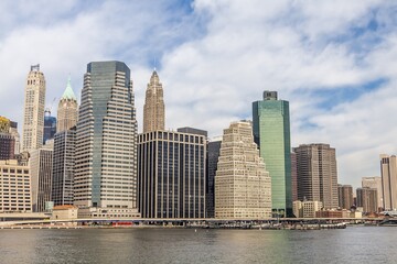 Fototapeta na wymiar Downtown Manhattan across the Hudson River and Brooklyn Bridge, New York, Manhattan, United States of America