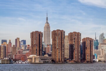 Fototapeta premium Manhattan, view of the Empire State Building and Midtown Manhattan across the Hudson River, New York, United States of America