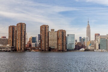 Fototapeta na wymiar Manhattan, view of the Empire State Building and Midtown Manhattan across the Hudson River, New York, United States of America