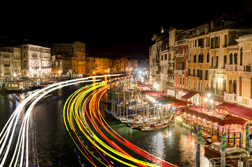 famous grand canale from Rialto Bridge at night with light trails, Venice, Italy